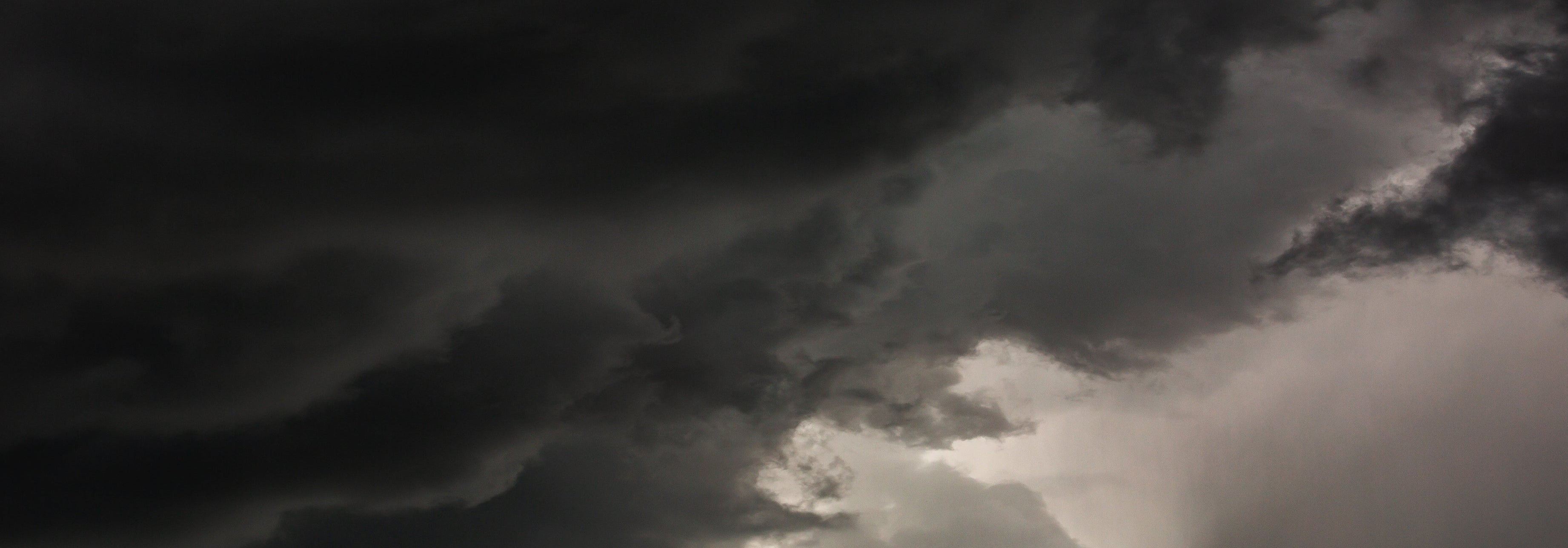 Dark, ominous clouds in a stormy sky